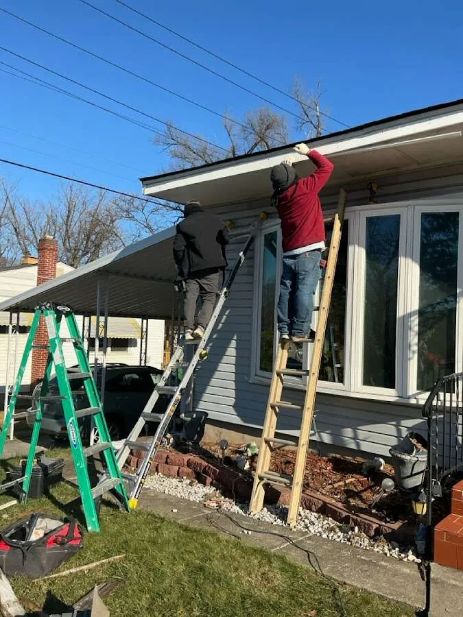 Restoration crew performing exterior repair in Countryside